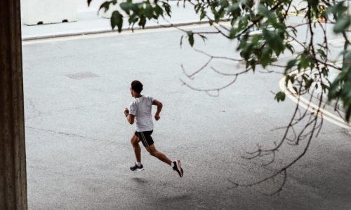 a man running on a street